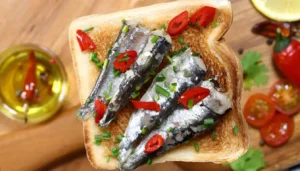 Sardine Toasts with Tomato & Sweet Onion